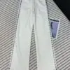 CHANEL Women's Baggy White Embroidered Jeans