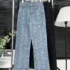 CHANEL Printed Denim Pants