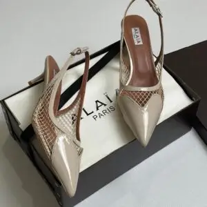 ALAIA High-Shine Patent Leather Pumps