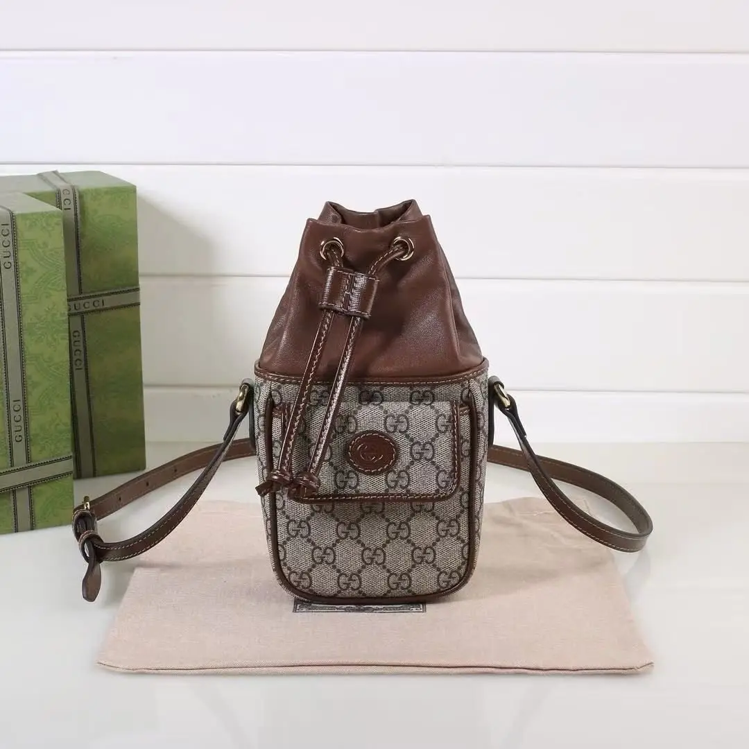GUCCI GG Supreme Mini Leather-Trimmed Bucket Bag GUCCI GG Supreme Mini Leather-Trimmed Bucket Bag