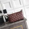 CHANEL Gold Ball Mini Case Lambskin Crossbody Bag