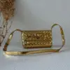 Bottega Veneta Vintage Brass Clutch